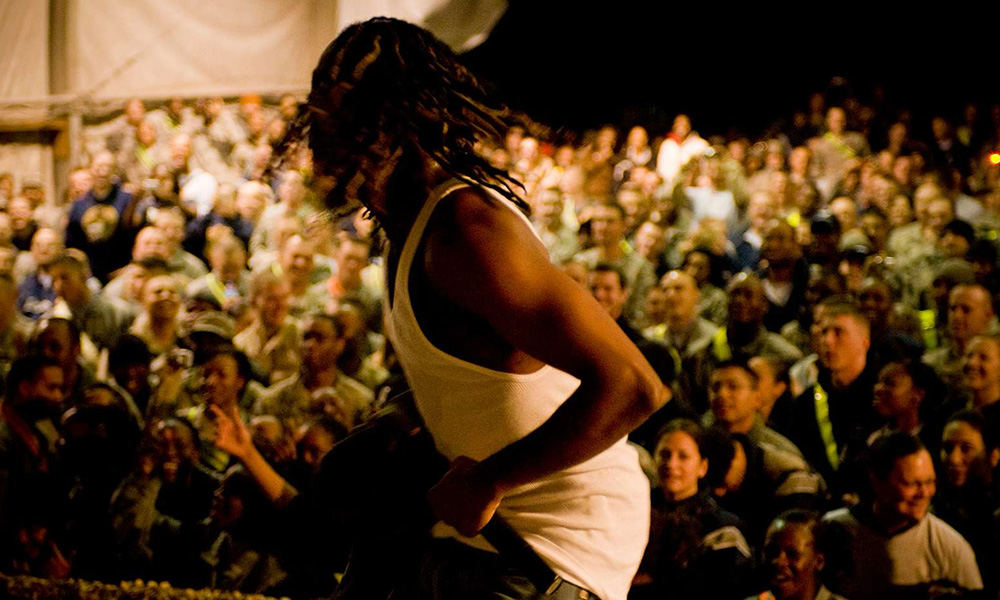 Rapper performing in front of a crowd